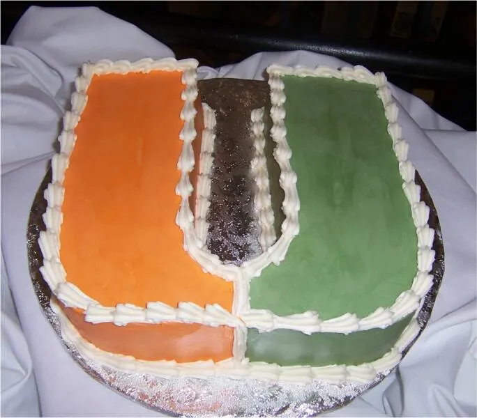Orange and green University of Miami U-shaped sports cake